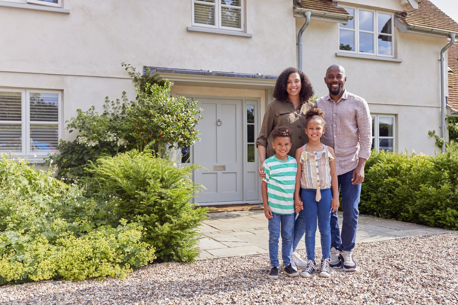 Happy Family Outside Home Who Needs A Will Resized