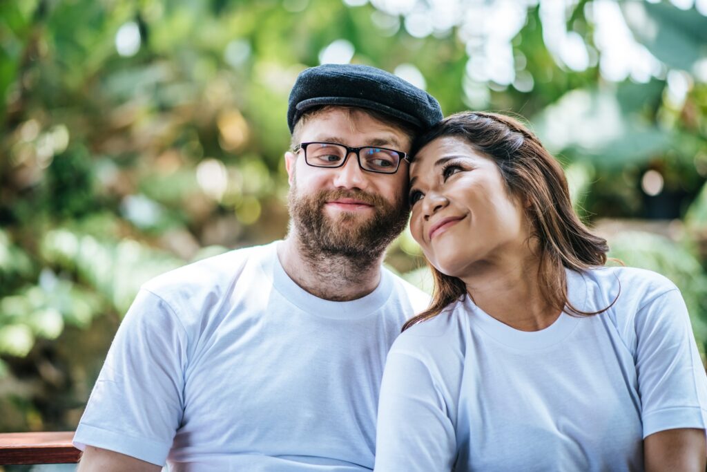 Diverse Couple Smiling In Love Considering Will Preparation Resized